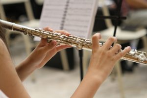 Hands playing flute