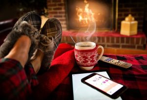 Relaxing by fire at home