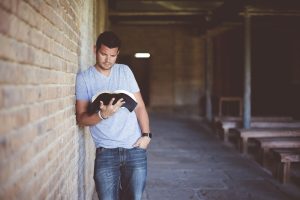 man reading a book
