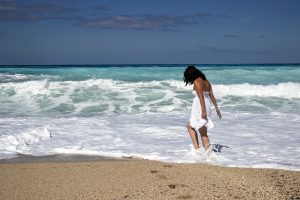 Girl walking on the beach