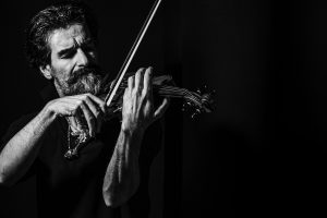 man playing violin