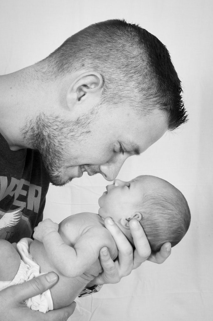Man holding baby
