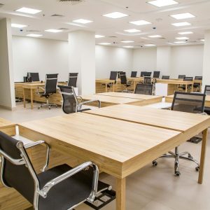 multiple office desks and areas to work