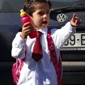 Young Girl pointing with her finger pointing to side